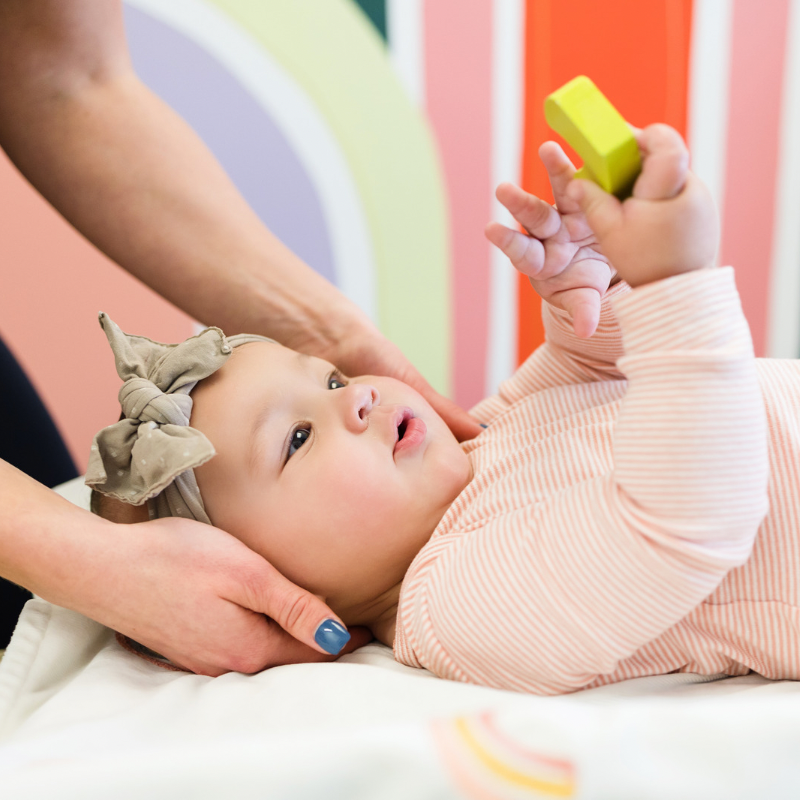 Chiropractor treating torticollis
